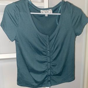 hippie rose cropped teal shirt, US size large.